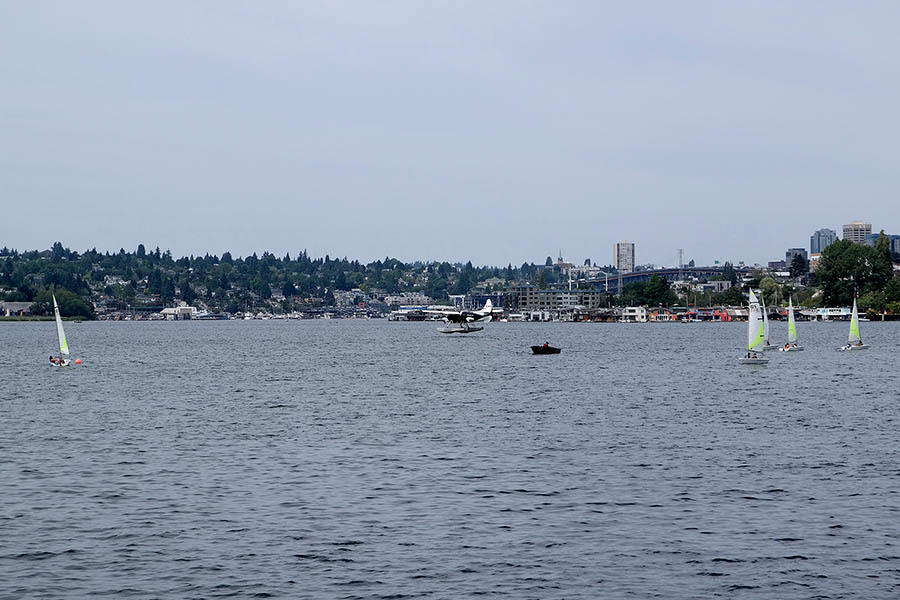 A seaplane lands on Lake Union